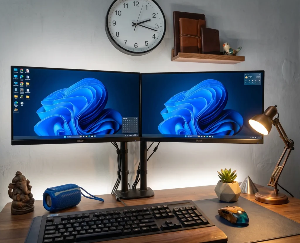 A professional workspace with three Acer KA222Q monitors in a triple display setup for coding and complex productivity tasks