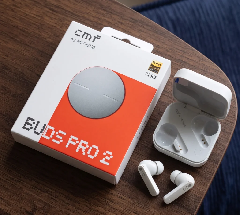 Retail box and white case of CMF Buds Pro 2 by Nothing, featuring a smart dial and rated as the best earbuds under 5000